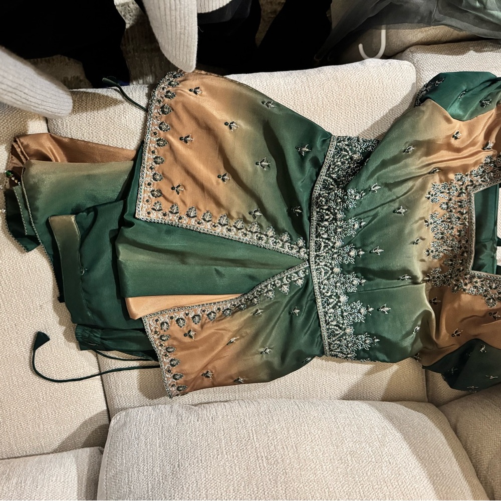 Green and brown Embroidered lengha. Has pants underneath.